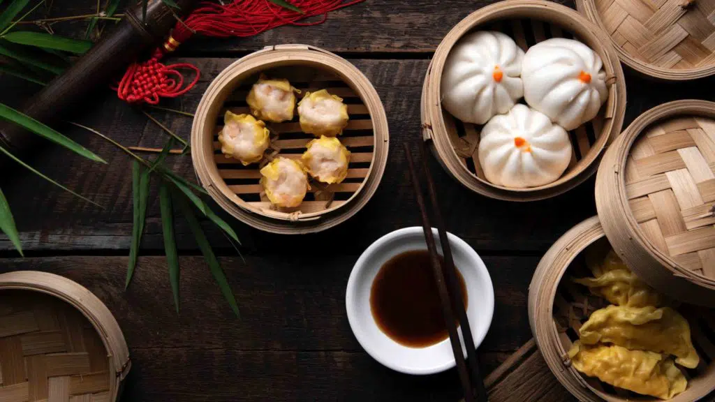 Dim Sum Dumplings on wooden table, Chinese traditional food