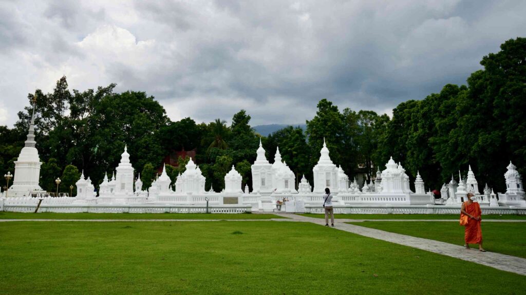 Wat Suan Dok with Monk Photographed by Ewan Cluckie at Tripseed