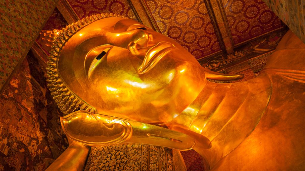 Reclining Buddha gold statue face Wat Pho